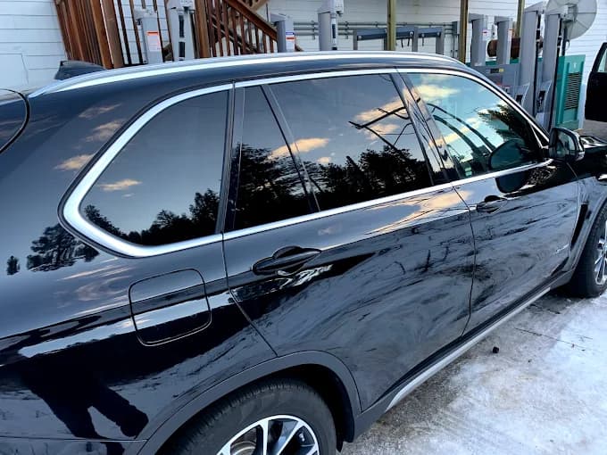 High-gloss finish on black SUV
